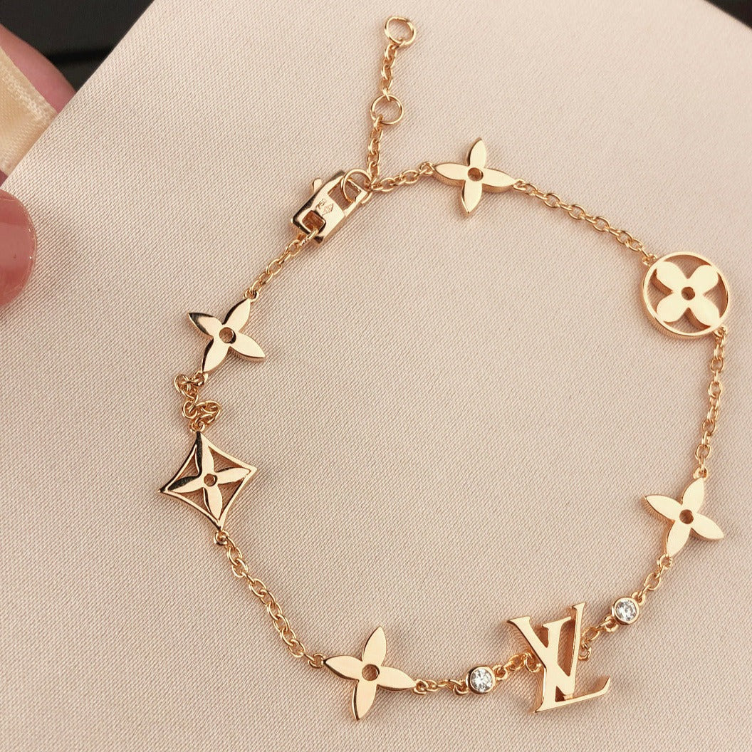 [CLOVER JEWELRY]STAR AND SUN 7 MOTIFS GOLD BRACELET