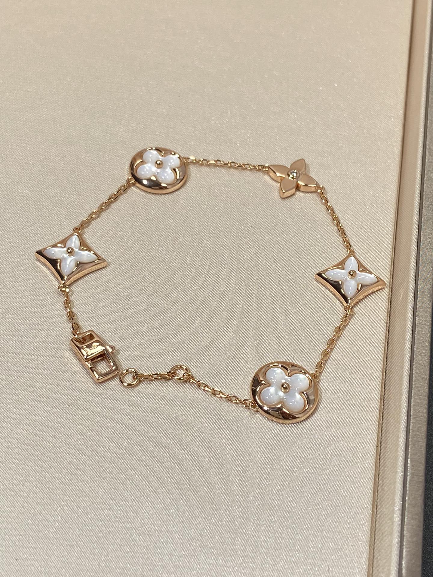 [CLOVER JEWELRY]STAR AND SUN 5 MOTIF MOP PINK GOLD BRACELET