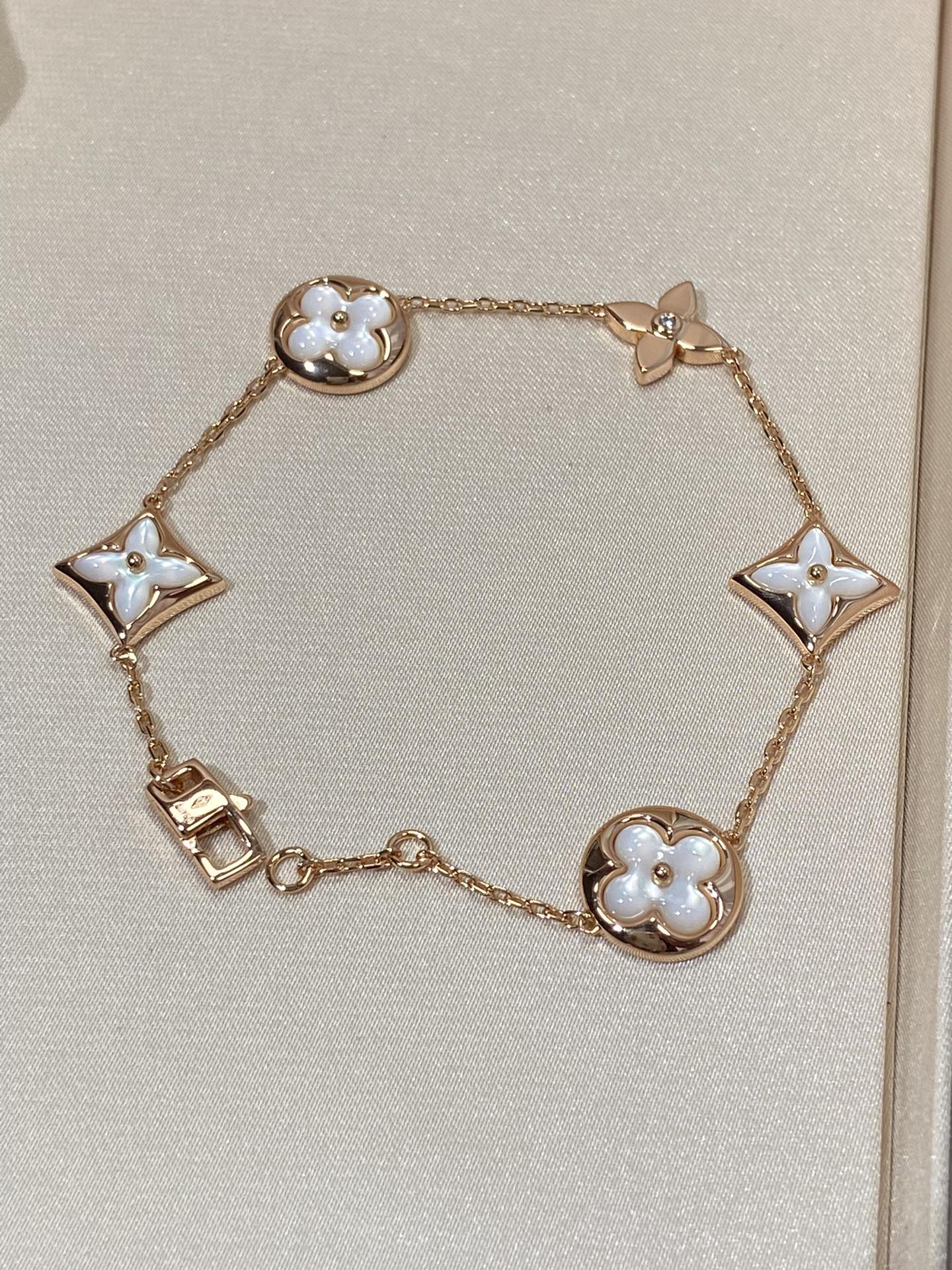[CLOVER JEWELRY]STAR AND SUN 5 MOTIF MOP PINK GOLD BRACELET
