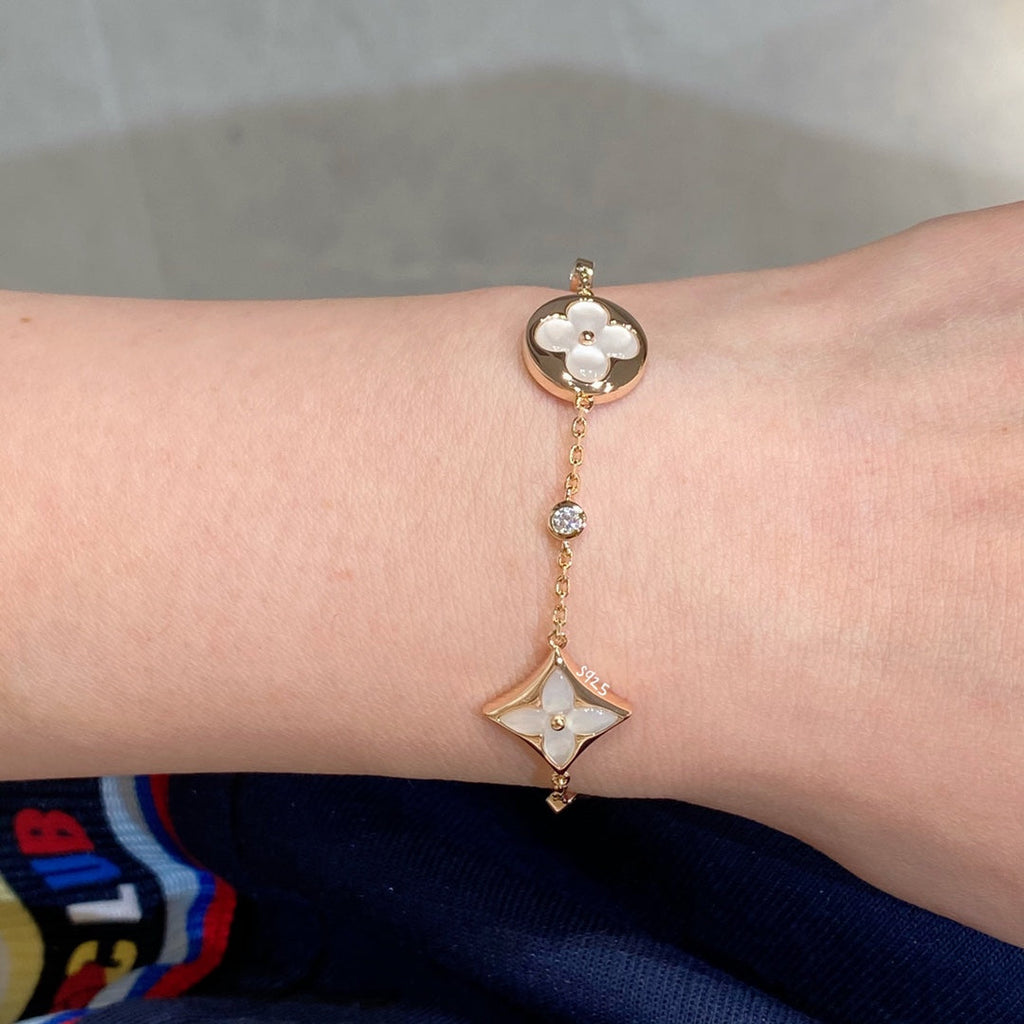 [CLOVER JEWELRY]STAR AND SUN 4 MOTIF WHITE MOP PINK GOLD BRACELET