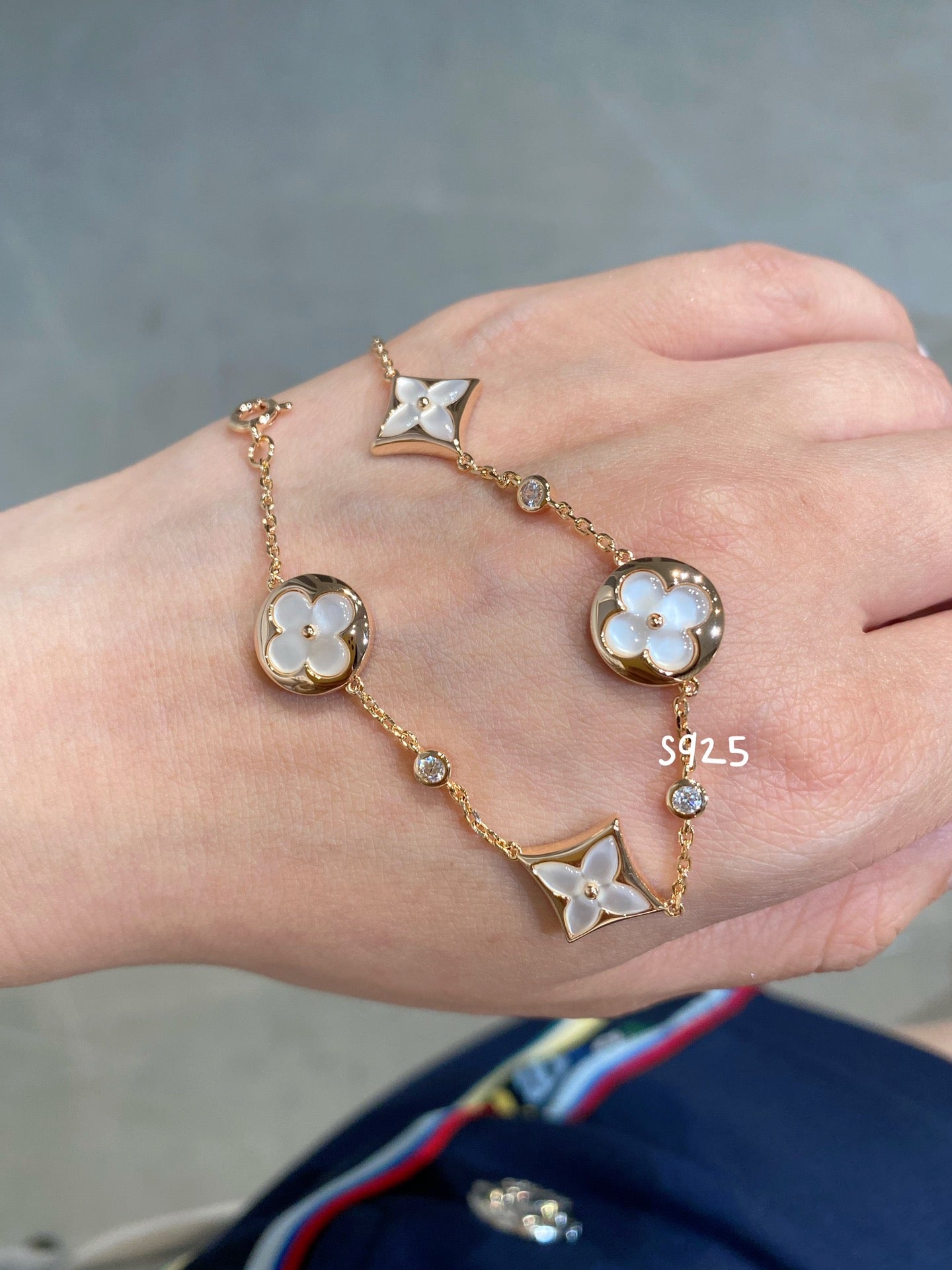 [CLOVER JEWELRY]STAR AND SUN 4 MOTIF WHITE MOP PINK GOLD BRACELET