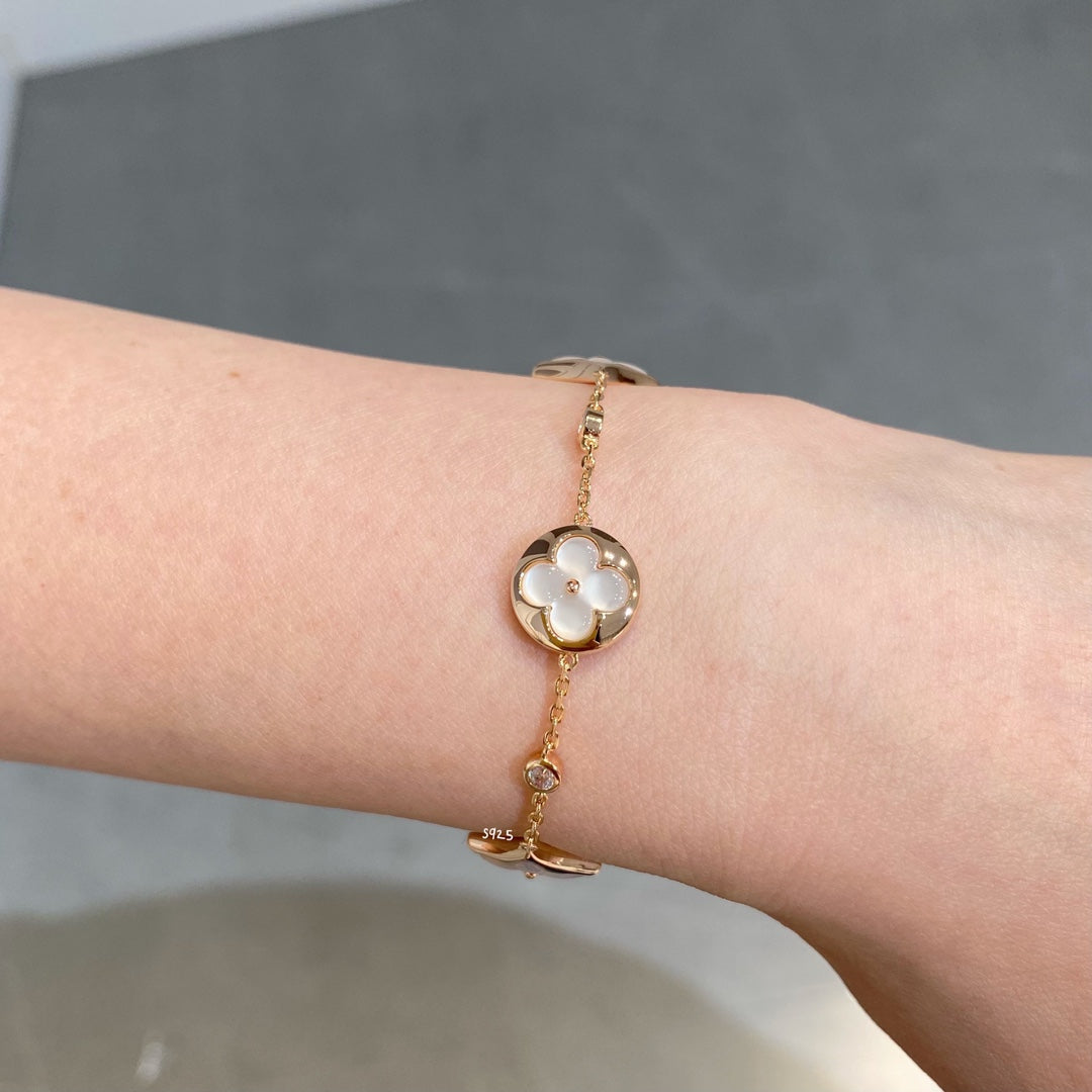 [CLOVER JEWELRY]STAR AND SUN 4 MOTIF WHITE MOP PINK GOLD BRACELET