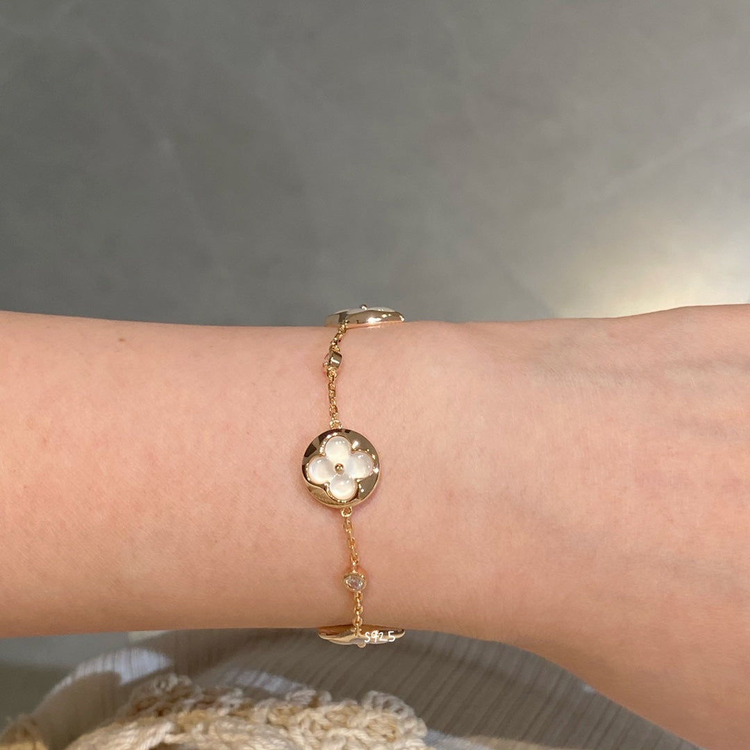[CLOVER JEWELRY]STAR AND SUN 4 MOTIF WHITE MOP PINK GOLD BRACELET