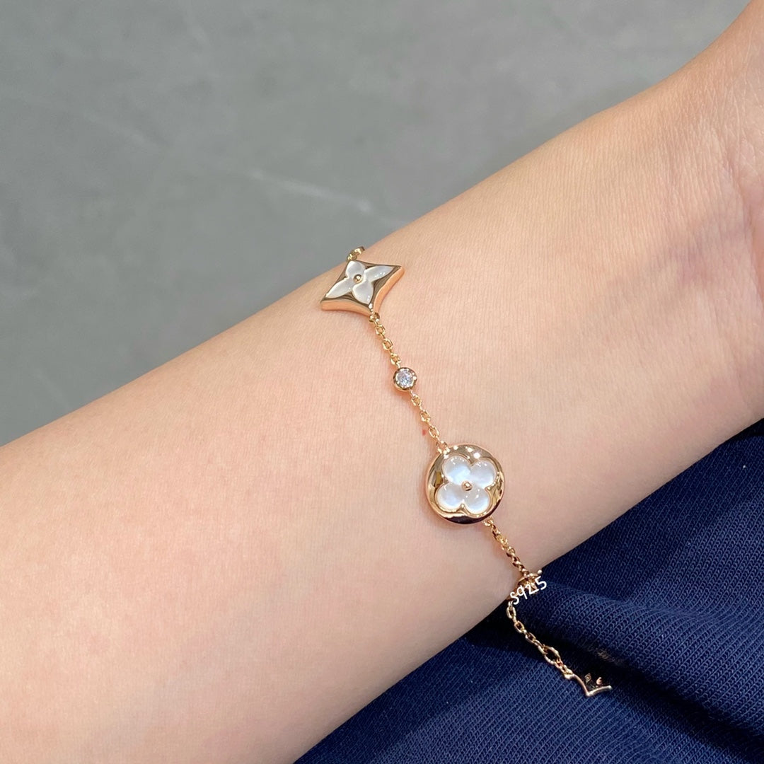 [CLOVER JEWELRY]STAR AND SUN 4 MOTIF WHITE MOP PINK GOLD BRACELET